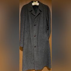 Harris Tweed Scottish Wool Coat. Features Three Button Closure, Deep Hand Pockets, Deep Inside Pocket, And Partial Lining. I Could Not Find A Size On Any Tag. Measurements Are Approximate: Length From Base Of Collar To Hem- 42” And Pit To Pit- 23”. Please See Pictures As Part Of Description Along With Labels. In Great Pre Owned Vintage Condition. Harris Tweed Jacket, Tweed Jackets, Harris Tweed, Tweed Jacket, Wool Coat, Inside Pocket, Trench Coat, Mens Jackets, Jackets & Coats