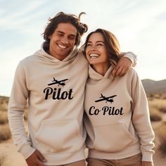 Gildan 18500 Unisex Blend Hoodie ✈STYLE & FIT .: Regular fit - standard length, the fabric easily gives into movement. .: 50% pre shrunk cotton, 50% polyester .: Front pouch pocket ✈ SIZE .: Most women find their typical size works best, since they are meant to fit a touch loose. .: Please see the size guide in listing photos for all measurements and information. .: Our size chart measurements are taken while laying flat, not a circumference measurement. ✈ HOW IT'S MADE .: Direct to Garment (DTG) high quality printing. ✈ CARE INSTRUCTIONS .: Machine wash cold, inside-out, gentle cycle with mild detergent and similar colors. .: No fabric softeners. .: Tumble dry low or hang-dry for longest life. .: Cool iron inside-out if necessary. Do not iron decoration. .: Do not dry clean. ✈ SHIPPING TI Pilot Clothing, Pilot Wedding, Airplane Wedding, Romantic Dinner Decoration, Airplane Shirt, Private Pilot, Pilot Gifts, Hoodie Style, Iron Decoration