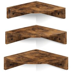 three wooden shelves with holes in them