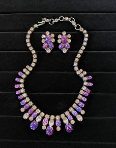 This is an extremely rare Schreiner necklace and earrings set. The stones are dragon's breath opal and pink rhinestones. Items are in great condition. Please review pics carefully and ask if you have any questions. Jewelry has not been cleaned or polished. Formal Multi-stone Costume Jewelry, Formal Multi-stone Crystal Jewelry, Pink Jewelry With Sparkling Stones For Formal Occasions, Pink Crystal Jewelry For Evening, Pink Gemstone Jewelry For Evening, Pink Costume Jewelry For Formal Occasions, Formal Pink Costume Jewelry, Pink Formal Costume Jewelry, Pink Costume Jewelry For Evening