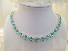 swarovski crystal choker necklace in silver and turquois stones #253 free shipping Elegant Turquoise Jewelry With Rhinestones, Turquoise Crystal Jewelry Gift, Turquoise Crystal Jewelry For Gifts, Adjustable Turquoise Crystal Jewelry, Turquoise Round Necklace For Wedding, Turquoise Wedding Necklaces, Turquoise Aquamarine Stone Jewelry, Turquoise Jeweled Wedding Jewelry, Turquoise Wedding Jewelry With Jewels