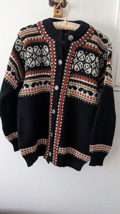 Vintage Norlender pure wool cardigan sweater.  Classic Norwegian design - always timeless.  Metal buttons up the front.  Very nice condition.  Made in Norway. Measurements length - 25" armpit to armpit - 20" Classic Winter Sweater With Fair Isle Pattern, Classic Fair Isle Sweater For Winter, Classic Fair Isle Winter Sweater, Classic Fitted Fair Isle Sweater, Wool Button-up Winter Sweater, Winter Merino Wool Sweater With Buttons, Classic Wool Outerwear With Fair Isle Pattern, Vintage Wool Cardigan With Fair Isle Pattern, Wool Long Sleeve Cardigan With Fair Isle Pattern