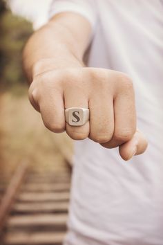 "Classic and personal! A solid silver signet ring with a personalized touch is a beautiful gift! Made of 925 sterling silver. Have your monogram engraved and make the ring unique! PRODUCT DETAILS The square surface is 1.74cm x 1. 43cm (approx. 0.68\" x 0.56\"). The lower part is 6.2mm wide (approx. 0.24\"). OPTIONS --> The ring is available in many different sizes. You may choose the one you wish from the drop-down menu. If you prefer a customized size feel free to contact us. --> The ring Classic Hand Stamped Rings, Everyday Symbolic Sterling Silver Signet Ring, Sterling Silver Signet Ring With Initials For Gift, Symbolic Signet Ring With Initials For Gift, Sterling Silver Wedding Signet Ring, Engraved Sterling Silver Initial Ring As Gift, Everyday Silver Signet Ring With Engraving Option, Minimalist Stamped Sterling Silver Signet Ring, Sterling Silver Stamped Signet Ring For Wedding