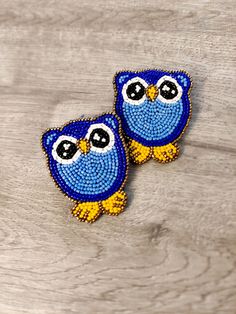 Cute Owl seed beads earrings are totally handmade. It has the charm that holds the attention of the crowd. Totally girlish and so new that you have not seen this unique design anywhere else. The vibrant colors and the making of the earring will surely have the quality to stand out in the crowd. They are So light weighted and easy to carry. I can say only one word for these earrings AWWWWWWWWWWWW. :) Playful Handmade Adjustable Earrings, Playful Handmade Drop Earrings, Handmade Adjustable Fun Beaded Earrings, Cute Multicolor Round Bead Earrings, Cute Multicolor Beaded Earrings, Fun Handmade Blue Jewelry, Handmade Blue Novelty Earrings, Blue Handmade Novelty Earrings, Adjustable Animal Design Earrings As Gift