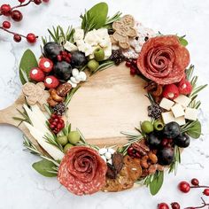 a wooden board with flowers and berries on it