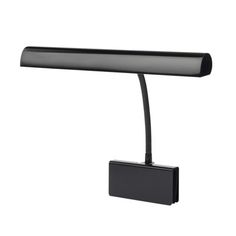 a black desk lamp on a white background