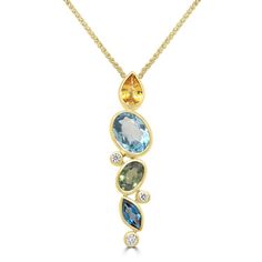 Metal: 9ct Gold (375)
Gemstones: Pear Cut Yellow Sapphire, Oval Cut Blue Topaz, Oval Cut Green Sapphire, Marquise London Blue Topaz
Setting: Rub-over
Diamond Weight: 3 x rub over set round brilliant cuts
Chain: Curb link 18" Gift Ideas For Christmas, Christmas Jewellery, Ideas For Christmas, Jewellery Gifts, Green Sapphire, Christmas 2023, Jewellery Gift, Christmas Gift Jewelry, Yellow Gold Pendants