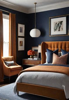 a bed room with a neatly made bed and blue walls