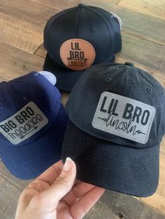 Big bro lil bro hats, leather hat patch kids hat.You can purchase the hat or just the patch. Toddler hat fits anywhere from 8 months - 5 years old. It does have a closure to make it tighter/looser.Youth hat fits anywhere from 5 years- 14 years. After that I would recommend a regular adult hat. I can do adult hats to match too.The patch is iron back and sticky so you can iron it right on! Big bro expiring construction Toddler custom shirt, youth custom shirt, adult custom shirts. I can use any co Adjustable Hats With Leather Patch As Gift, Leather Patch Cap Hat Gift, Leather Patch Cap As A Gift, Leather Patch Cap - Gift, Leather Patch Cap As Gift, Personalized Brown Hat As A Gift, Brown Baseball Cap As Gift, Leather Hat Patch, Toddler Easter Shirt