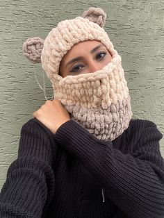 Keep your head warm this winter with our super soft and cute ears balaclava. This one-size-fits-all balaclava will keep you cozy and stylish all year round.Our cute ears balaclava is perfect for the cold winter season. It's super soft and cute, so you'll never want to take it off! This pattern is absolutely adorable and will keep you warm and looking good in the process. Slip one on before going out for a walk with your pup. Stay warm as you're making new friends.  Made To Order (8-10 days) I ca Winter Acrylic Balaclava Beanie, Acrylic Winter Balaclava Beanie, Acrylic Balaclava Beanie For Winter, Warm Beige Crochet Hat For Winter, Cold Weather Acrylic Balaclava In Beanie Style, Warm Acrylic Balaclava For Winter, Knitted One Size Balaclava For Cold Weather, Knitted Balaclava For Cold Weather, One Size, Hand Knitted Beige Crochet Hat For Winter