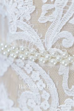 Component of fashionable and exquisite pearls and clear beads, this best bridal sash belt online will add elegance and romance to any wedding gown. Satin is available for the ribbons. content chiffon, pearls, alloy embellished portion length 45cm, width 1cm ribbon length 100cm, width 1.2cm Elegant White Bride Sashes, Elegant Lace Bridal Belt For Party, Elegant Silver Bridal Belt With Pearl Embroidery, Elegant White Bridal Belt With Pearl Embroidery, Elegant Bridal Accessories With Pearl Embroidery, Elegant Pearl Embroidered Bridal Accessories, Elegant Bridal Sashes, Elegant Bridal Sashes For Bride, Elegant White Sash For Mother Of The Bride