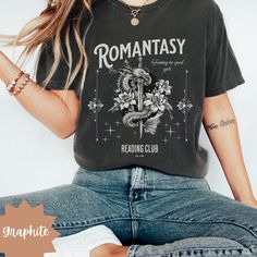 🌸 Romantasy Reader Comfort Colors T-Shirt for Booklovers, Romance Fantasy Book Reading Shirt for Women, Gift for Daughter 📚 Show off your love for fantasy and romance books with our Romantasy Reading Club shirt. Crafted from 100% medium-weight cotton, this shirt offers comfort and durability.  🌸 Embrace your inner bookworm and join the club today! ☛ DESCRIPTION: --Made with medium weight fabric. --100% ring spun US cotton --Relaxed fit --Crew neckline --Pre-shrunk fabric. Check size chart for Black Literary Top With Graphic Print, Reading Club, Join The Club, Reading Shirts, Fantasy Book, Book Reading, Gift For Daughter, Club Shirts, Book Stuff