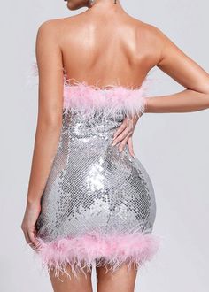 Sequin Strapless Dress For Club Parties, Strapless Sequin Dress For Club, Glamorous Strapless Dress With Contrast Sequin, Fitted Strapless Dress With Feathers, Pink Strapless Sequin Dress For Night Out, Party Sequin Mini Dress With Feather Trim, Party Mini Sequin Dress With Feather Trim, Mini Sequin Dress With Feather Trim For Party, Fitted Feathered Strapless Dress For Night Out