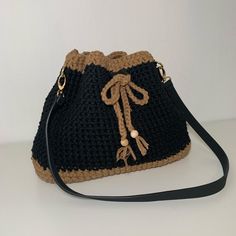 Handmade crochet bag made from 3mm cotton macrame cord with faux-leather base!  - Inner pocket to fit your keys or smart phone  - Durable material to complete your smart casual outfits! Black Crochet Pouch Bag With Braided Handles, Everyday Macrame Straw Bag, Casual Crochet Pouch Bag For Everyday Use, Casual Crochet Pouch Bag With Braided Handles, Casual Macrame Bag For Daily Use, Black Crochet Pouch Bag For Everyday, Black Crochet Straw Bag, Casual Crochet Pouch Bag, Black Macrame Crochet Bag For Everyday Use