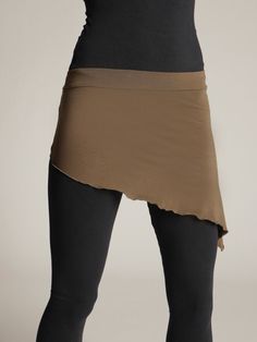 A fun asymmetrical skirt to be worn alone or layered on skirts or pants. Picture shows Three skirts layered together. Light blue in photo is Stone. Olive green in photo is Kelp. Sewn from a luscious jersey-knit blend of Soy (50 Organic Cotton (44%) and Spandex (6%). Colors: Stone, Mulberry, Creme, Ebony, Grass, Chocolate, Kelp Sizes: X-Small thru X-large Womens Skirts, Asymmetrical Skirt, Organic Fabrics, Cotton Skirt, Crescent, Knit Jersey, Olive Green, Ballet Skirt, Womens Skirt