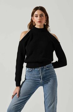 Bring the drama in this embellished cold shoulder sweater! Perfect for date night or anytime you want to feel gorgeous! Ribbed knit design with faux pearl embellishments in an open shoulder (cold shoulder) style. Dry clean recommended - 84% Polyester, 16% Nylon Cold Shoulder Styles, Cutout Sweater, Woven Sweater, Cold Shoulder Long Sleeve, Astr The Label, Cold Shoulder Sweater, Cozy Knits, Shoulder Sweater, Knitting Designs