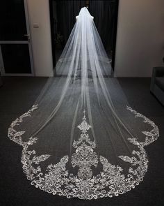 a wedding veil is shown on the floor