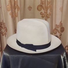 A Rare Find! Classic Handmade Finely Woven Straw Panana Hat From 1920's. Was In Storage All These Years And In Great Condition. Measures 22" On Inner Leather Band. Black Fabric Ribbon On Outside. Needs A New Appreciate Home, Enjoy! White Fitted Panama Hat With Curved Brim, White Fitted Brimmed Panama Hat, White Brimmed Fedora For Kentucky Derby, Classic White Wide Brim Fedora, Classic White Flat Brim Hat, White Fedora With Flat Brim, White Fitted Fedora With Flat Brim, Fitted White Fedora With Flat Brim, White Classic Hat With Curved Brim