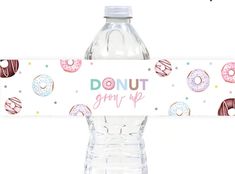 a water bottle label that says sweet one with donuts on the front and bottom