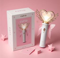 the cupid light is next to its box