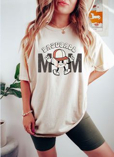 Casual Sublimation Print T-shirt For Mother's Day, Sporty Graphic Print T-shirt For Mother's Day, Funny White Sublimation T-shirt With Graphic Print, Casual T-shirt With Sublimation Print For Mother's Day, White Graphic Print Transfers For Sports Events, Graphic Print Cotton Transfers For Fans, White Sporty T-shirt For Mother's Day, Sporty White T-shirt For Mother's Day, Casual White Cotton Transfers