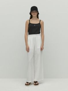 This is a trendy and feminine pants by DEPOUND that is made out of high quality and sturdy material. With distinctive mood of the design and comfortable wear, you can style it for your casual daily outfit.- Linen like ribbed fabric- Metal charm detail below the pocket- Elastic waistband with string Modern White Ankle-length Wide Leg Pants, Chic Viscose Bottoms For Daywear, Casual Wide-leg Viscose Bottoms, Modern Trousers For Loungewear, Casual Viscose Bottoms, White Viscose Pants For Spring, Casual Straight Viscose Pants, Casual Viscose Long Pants, Casual High-waisted Viscose Pants