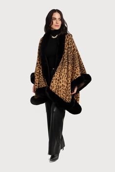 The Faux Fur Cheetah Patterned Cape Kimono is exactly what your wardrobe needs this fall and winter season. Its fierce, bold, cheetah print pattern will command attention whether worn with a simple pair of jeans and sneakers for a laid-back look or with heels and a dress for a more elegant occasion! Fabric: 100% Acrylic Fur: 100% POLYESTER Size: 160X110 CM Color: Light Beige or black cheetah Width: 110 cm Length: 64 cm Faux Fur Cape, Animal Print Outfits, Fur Cape, Black Camel, Print Kimonos, Trendy Accessories, Dress And Heels, Fur Jacket, Fur Trim