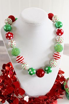 "A festive Christmas palette of red and green, along with my special Christmas sprinkles beads is the perfect thing for Christmas baking. Makes a great stocking stuffer or Christmas present. A matching necklace with a rhinestone Gingerbread Man is also available! Check my Christmas section to find that listing. Visit my Christmas section for more festive necklaces: https://www.etsy.com/shop/ChunkyStuffByLBB?section_id=16141299&ref=shopsection_leftnav_5 ✔ All necklaces come with a 2\" extende Christmas Palette, Chunky Bead Necklace, Festival Necklace, Christmas Sprinkles, Chunky Bead Necklaces, Chunky Necklaces, Bubblegum Necklace, Chunky Bracelet, Christmas Necklace