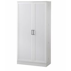 a tall white cabinet with two doors