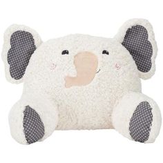 a white stuffed animal with polka dots on it's ears