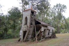 an old run down church in the woods