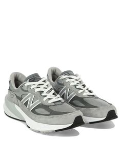 New Balance's low-top sneakers crafted in grey suede mesh with reflective details. Featuring lace-up closure, a round-toe silhouette, ENCAP midsole, fabric lining and comfort and FuelCell rubber outsole. The design is completed by the unmistakable reflective N patch embroidered on side and NB detailing at heel.Gender: MENMaterial: PIGSKIN/MESHColor: GREYMade in: USProduct ID: M990GL6COOLGREY*Import tax/duty will be calculated at checkout (If applicable) New Balance Made In Usa, Sneaker New Balance, Grey New Balance, Sporty Pants, Balance Sneakers, New Balance Men, Comfort Design, Loafer Sneakers, New Balance Sneakers