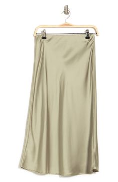 Elevate your wardrobe with this pull-on bias satin midi skirt for elegant, feminine style. 31" length (size S) Elasticized waist Pull-on style Satin construction 97% polyester, 3% spandex Machine wash cold, line dry Made in USA Model’s stats for sizing: 5’10” height, 34” bust, 27” waist, 35” hips. Model is wearing size S. Elegant Feminine Style, Midi Skirt Outfit, Elegant Feminine, Satin Midi Skirt, Blake Lively, Nordstrom Store, Skirt Outfits, Feminine Style, Dark Pink