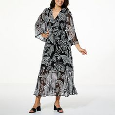 Antthony Printed Mesh Knit Long-Sleeve Maxi Dress  Bea-YOU-tiful! A flowy, stretch mesh knit fabrication, pretty & playful print, and a figure-flattering Bohemian-inspired maxi dress silhouette give this must-have design a lovely, ladylike look for any time of year. Tie Skirt, Urban Looks, Dress Silhouette, Long Sleeve Maxi, Draped Fabric, Leaf Print, Long Sleeve Maxi Dress, Fitted Dress, V Shape