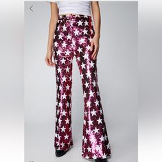 The Pants Edit. Feel Like The Centre Of Attention In Our Flare Pants, Made In High Quality Sequin Fabric, With A Flattering Flared Silhouette And A Statement Star Pattern. Style The With A Crop Top Or Bralette For A Stellar Occasion Look, Perfect For Anything From Party Nights To Festival Weekends And Concerts. Small Star Sequin Flare Pants High Quality Sequin Fabric Flattering Flared Silhouette Stellar High Waistline Fun Star Patterning Zip Fastening In Back Model Wears A Size S (Us Size 6/Uk S Red And White Pattern, Sequin Flare Pants, Swimsuit Skirt, Going Out Trousers, Spring Break Outfit, Sequin Pants, Sequin Outfit, Outfit Plan, Country Concert Outfit