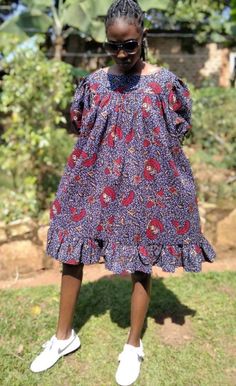 "Get yourself or your loved one this lovely deep blue African print dress. It's A line in shape and therefore very roomy and comfortable. Made in 100% cotton fabric. It fits up to bust measurements  41 inches.  Full length of dress is 38\".  Gathered puff sleeve with elasticated band. With pockets. Kindly note that due to variations in computer monitors, tablets and/or mobile device settings, actual fabric colours may slightly differ from the pictures viewed on screen. Packaging: in order to red Indigo Knee-length Cotton Midi Dress, Blue Printed Cotton Mini Dress, Indigo Cotton Mini Dress, Indigo Mini Length Cotton Dress, Indigo Cotton Dress With Floral Print, Indigo Cotton Dresses With Floral Print, Indigo Cotton Dress With Short Sleeves, Blue African Print Dress, Blue African Print