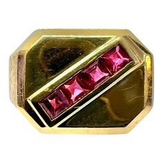 14K yellow gold ring with square cut rubies.    Sophia D by Joseph Dardashti LTD has been known worldwide for 35 years and are inspired by classic Art Deco design that merges with modern manufacturing techniques. Classic Gold Rectangular Ruby Ring, Classic Rectangular Ruby Ring In Gold, Classic Gold Ruby Ring With Rectangular Shape, Luxury Rectangular Ruby Ring, Red Rectangular 14k Gold Ring, Rectangular Ruby Ring In Gold, Gold Ruby Ring With Rectangular Stone For Anniversary, Gold Rectangular Ruby Ring, Rectangular Ruby Ring With Gold Setting