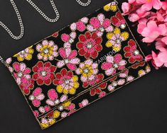 This luxury handbag made with high quality beads, gems and cotton with classy strawberry design. And you are going to get many compliments from that people who knows the taste of luxury and handmade products 🌷 This bag is eye-catching with its handmade beads and goes well with traditional and modern outfits. You can use the purse/bag with or without the sling or chain. A heavy amount of natural beads is embroidered into the bag.  🌷 The luxury fashionable evening classy bags feature clutches an Multicolor Handwork Evening Bag For Party, Embellished Multicolor Evening Bag As Gift, Multicolor Embellished Evening Bag As Gift, Beach 2024, Classy Bags, Festival Purse, Strawberry Design, Embellished Bags, Wedding Purse