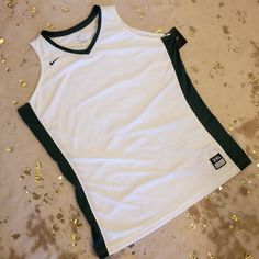 New With Tags Nike Brand 3x White Jersey With Green Sides And Neckline White Casual Nike Tank Top, Casual White Nike Tank Top, Nike Green Sleeveless Top, Green Sides, Nike Shirts Women's, Seahawks Shirt, Usa Soccer Jersey, Wolverine Shirt, Running Singlet