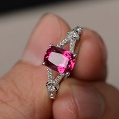 This is a gorgeous handmade creation. Its beauty is its simplicity & Elegance. The 6*8mm cushion cut lab ruby is crafted in sterling silver with rhodium plated. It's made to order and it will take about 7-10 days to make it. All item is sent in a beautiful gift box You can realize more lovely stuff clicking the link https://www.etsy.com/shop/knightjewelry?refshopsection_shophome_leftnav Please leave the correct address and you phone number for delivering successfully. Fine Jewelry Ruby Ring With Rectangular Stone, Ruby Jewelry With Cushion Cut Center Stone, Cushion Cut Ruby Jewelry With Center Stone, Square Cut Ruby Jewelry Fine Jewelry, Fine Jewelry Ruby Rings With Rectangular Stone, Elegant Silver Ruby Ring With Cushion Cut, Gift Ruby Ring With Accent Stones Cushion Cut, Silver Cushion Cut Rings With Gemstone Accents, Gift-ready Cushion Cut Ruby Ring With Accent Stones