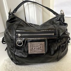 In Excellent Used Condition, Has Sliver Tone Hardware , Very Spacious, Interior Has Very Tiny Stains , Exterior Is Clean, 14 X 10 Inches Luxury Coach Hobo Bag With Silver-tone Hardware, Coach Silver Shoulder Bag With Gunmetal Hardware, Coach Shoulder Bag With Double Handle And Palladium Hardware, Coach Silver Bag With Gunmetal Hardware, Silver Coach Bags With Gunmetal Hardware, Coach Poppy, Bags Coach, Coach Bags, Poppies