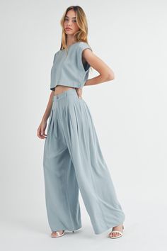 This Solid Crop Top & Pleated Wide Leg Pants set is a must-have for any formal occasion. With its simple and classic design, it offers an effortless yet elegant look. The short sleeve crop top and wide leg pants provide a comfortable fit, while the pleated details add a touch of sophistication. Perfect for any fashion-forward individual. Solid Crop Top, Simple Crop Top, Top And Wide Leg Pants, Pleated Wide Leg Pants, Short Sleeve Crop Top, Short Sleeve Cropped Top, New Tops, Formal Occasion, Sale House