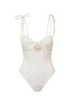 Timeless and sophisticated in the Chamomile One Piece. This must-have one-piece is extra charming, designed with an eyelet fabric and with a floral embossed on the center front. The swimsuit includes underwire for an easy and flattering fit, and self tie thin spaghetti straps. Love Shack Fancy Bathing Suit, Love Shack Fancy Swimwear, Elegant Bathing Suits, Girly Swimwear, Aesthetic One Piece Swimsuit, Coquette Swimsuit, One Piece Swimsuit Aesthetic, Elegant Swimsuit, Cute One Piece Bathing Suits