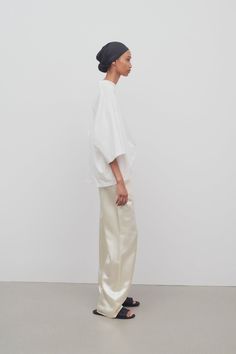 Encore Pant White in Viscose – The Row White Tonal Outfit, The Row Styling, The Row Outfits Summer, The Row Fall 2024, The Row Inspired Outfits, Silk Wide-leg Pants With Pressed Crease, Satin Tapered Leg Workwear Pants, Satin Tapered Leg Work Pants, Satin Tapered Leg Pants For Work