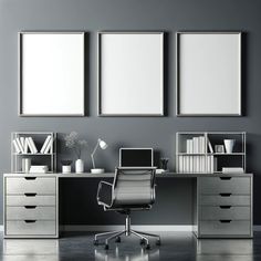 an office desk with three framed pictures on the wall