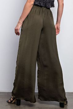 Give your wardrobe a stylish upgrade with these Olive Waist Elastic Wide Leg Satin Pants. Made of smooth satin fabric with an elasticized waistband, these pants provide a flattering fit while allowing for maximum comfort. The wide leg cut adds sophistication to your look. Fabric & fit: Model is wearing size Small. Satin Pants, Satin Fabric, Wide Leg, Satin, Elastic, Wardrobe, Pants, How To Wear, Fabric