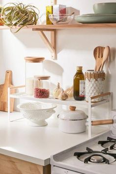 the kitchen counter is clean and ready to be used for cooking, including garlic oil