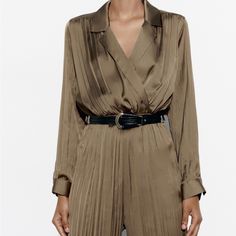 Wrinkled Effect Jumpsuit With V-Neck Lapel Collar And Long Sleeves. Elastic Waist With Contrasting Belt. Straight Leg. Polyester Color: Olive Green Elegant Zara Jumpsuits And Rompers For Work, Zara Long Sleeve Jumpsuit For Work, Elegant Zara Jumpsuits And Rompers, Formal V-neck Jumpsuits And Rompers For Fall, V-neck Jumpsuits And Rompers For Office In Spring, Elegant Long Sleeve Jumpsuits And Rompers By Zara, Zara Long Sleeve Jumpsuits And Rompers For Fall, Zara Long Sleeve Jumpsuits And Rompers For Party, Zara Long Sleeve Jumpsuits For Fall