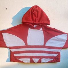 Brand New Without Tags High Quality Thick Material Vintage Style Red Orange Color Adidas Cropped Large Logo Hoodie. You've Never Been Afraid To Make A Statement. Neither Has The Trefoil. Stand Out In The Adidas Cropped Large Logo Hoodie. Just Throw It On And Head Out The Door. Loose Fit. Drawcord-Adjustable Hood. Cropped Hooded Sweatshirt. Drop Shoulder. Ribbed Cuffs. 100% Cotton French Terry. Machine Wash. Imported. Original Price $65 Without Tax Or Shipping Red Cotton Hip Hop Hoodie, Red Sportswear Tops For Streetwear, Red Cotton Sweatshirt In Athleisure Style, Red Tops For Streetwear Sportswear, Oversized Red Hip Hop Hoodie, Red Oversized Hip Hop Hoodie, Red Cotton Sportswear Sweatshirt, Oversized Red Hip Hop Top, Oversized Red Cotton Hoodie