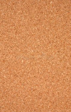 a close up view of a cork board textured with brown and tan tones stock photos